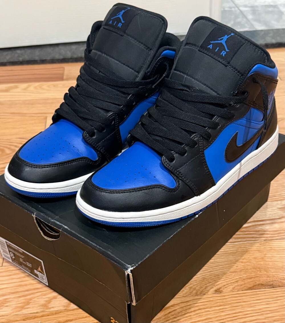 Air Jordan 1 Mid in royal blue and black.
